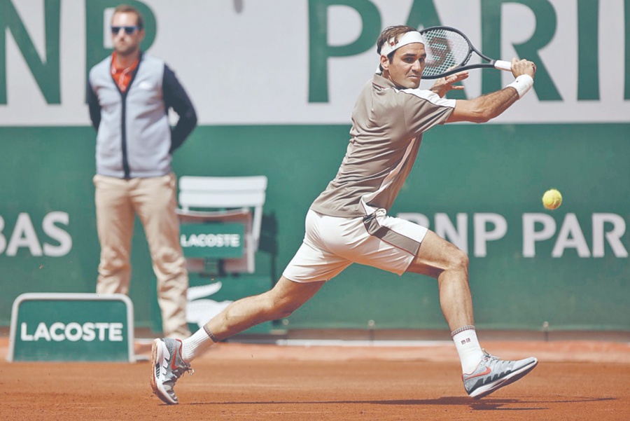 Federer regresa a cuartos de Roland