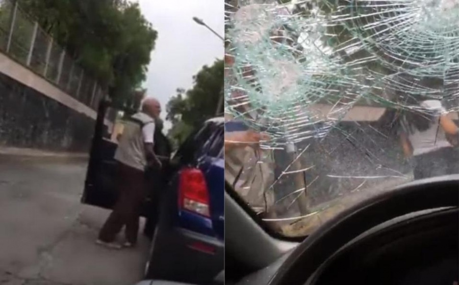 Exhiben a #LadyPiñata; joven agrede y destroza un auto tras choque