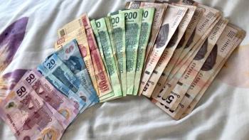 Peso mexicano gana por debilidad de d&oacute;lar, cautela antes de anuncios Fed