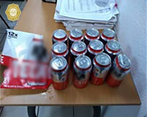 Mujer es detenida por robar cerveza