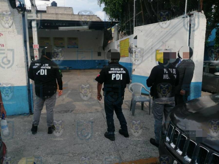 Fiscalía recupera dos camionetas en cateo a autolavado en Iztacalco