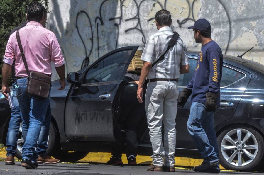 Hallan cuatro cadáveres al interior de un auto de lujo en Tlalpan