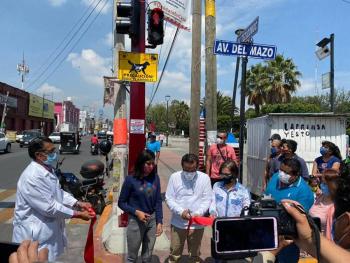 Colocan se&ntilde;alamientos para evitar atropellar a perros y gatos en Valle de Chalco