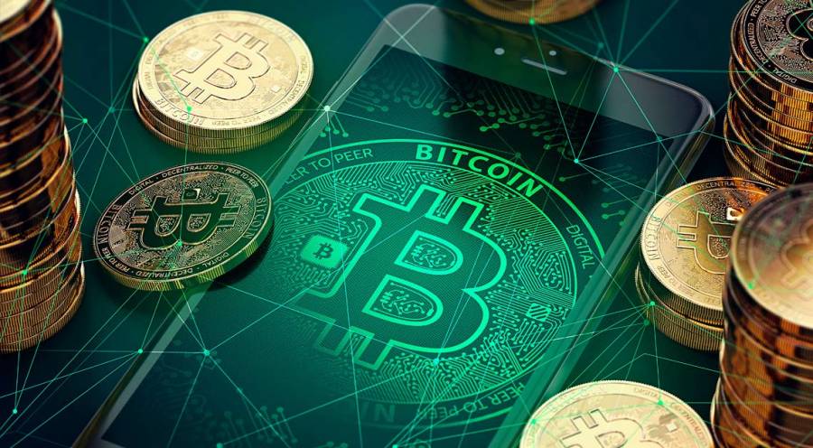 El bitcoin rompe nuevo récord y cotiza en 60,000 dólares