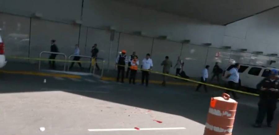 Balacera en la Terminal 1 del AICM deja dos policías heridos y un detenido