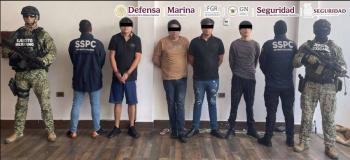 Detienen a cuatro hombres con armas largas y veh&iacute;culos en Culiac&aacute;n, Sinaloa