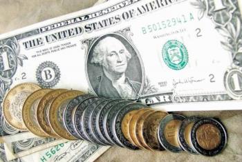 El peso mexicano cede 18.56 centavos frente al dólar