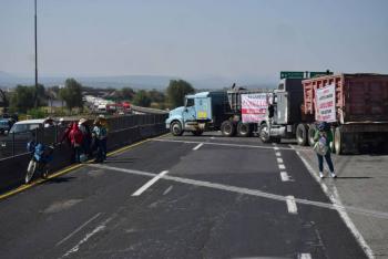 Transportistas y productores exigen di&aacute;logo directo y niegan tintes partidistas