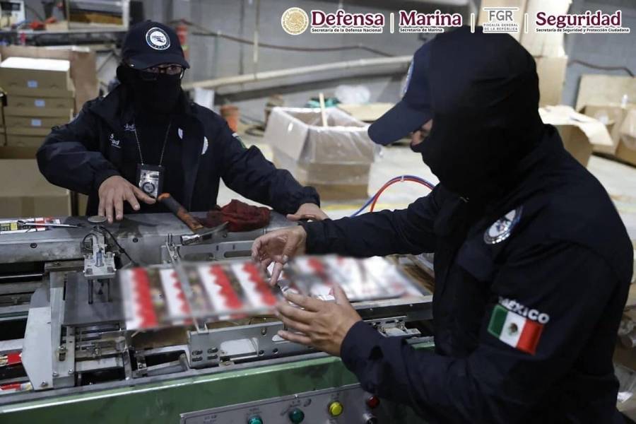 Vinculan a proceso a dos canadienses y un mexicano por operar fábrica clandestina de cigarrillos en Huixquilucan